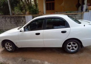 Daewoo Lanos   2004 - Cần bán gấp Daewoo Lanos đời 2004, màu trắng