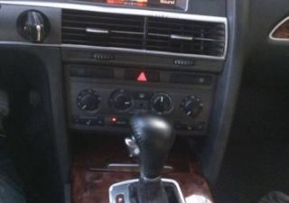 Audi A6 AT 2006 - Bán ô tô Audi A6 AT đời 2006, màu đen xe gia đình, giá chỉ 655 triệu