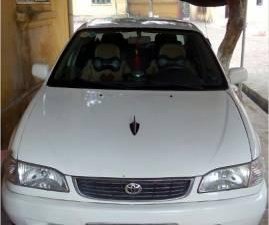 Toyota Corolla     2001 - Bán Toyota Corolla đời 2001, màu trắng, xe nhập số sàn