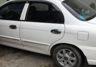 Kia Spectra 2004 - Chính chủ bán Kia Spectra đời 2004, màu trắng