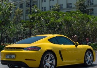 Porsche Cayman 718 2017 - Cần bán lại xe Porsche Cayman 718 2017, màu vàng, nhập khẩu nguyên chiếc như mới