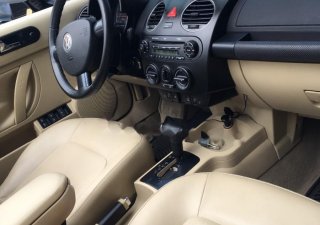 Volkswagen New Beetle 2009 - Bán Volkswagen New Beetle đời 2009, màu kem (be), nhập khẩu nguyên chiếc số tự động
