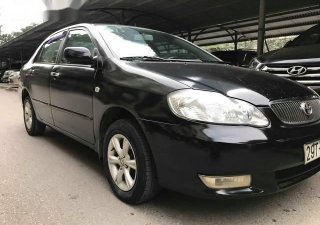 Toyota Corona  G 1.8  2004 - Cần bán gấp Toyota Corona G 1.8 sản xuất 2004, màu đen số sàn