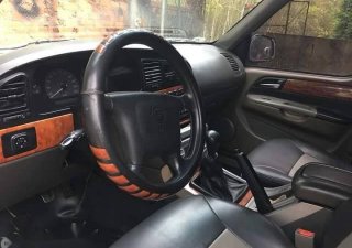 Ssangyong Musso 2002 - Bán xe Ssangyong Musso 2002, màu bạc  
