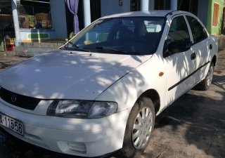 Mazda 323 2000 - Bán xe Mazda 323 đời 2000, màu trắng nhập khẩu, giá chỉ 85 triệu