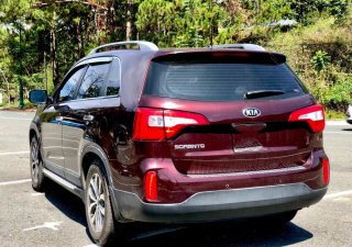 Kia Sorento 2016 - Cần bán xe Kia Sorento đời 2016 màu đỏ bản full GATH chạy lướt