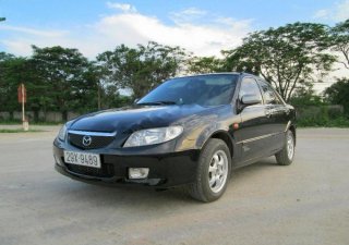 Mazda 323 GLX 2003 - Chính chủ bán Mazda 323 GLX năm 2003, màu đen