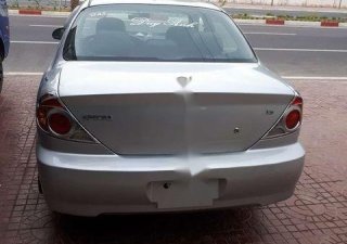 Kia Spectra 2004 - Bán ô tô Kia Spectra sản xuất 2004, màu bạc chính chủ