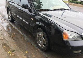 Daewoo Magnus 2004 - Cần bán gấp Daewoo Magnus đời 2004, màu đen giá cạnh tranh