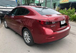 Mazda 323 1.5 AT 2016 - Bán xe Mazda 323 1.5 AT sản xuất năm 2016, màu đỏ