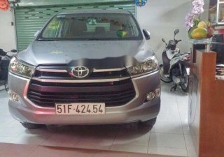 Toyota Innova 2016 - Cần bán lại xe Toyota Innova đời 2016, màu bạc, giá tốt