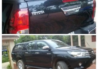 Toyota Hilux Lx 2016 - Cần bán gấp Toyota Hilux Lx đời 2016, màu đen xe gia đình, giá chỉ 750 triệu