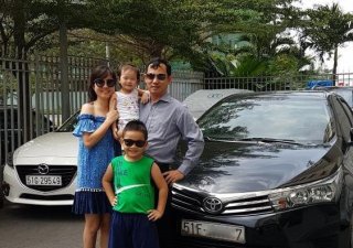 Toyota Corolla altis   1.8MT 2014 - Bán xe Toyota Corolla altis 1.8MT đời 2015, màu đen số sàn, 580 triệu