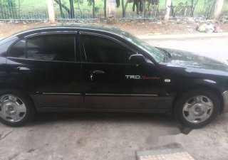 Daewoo Magnus 2004 - Bán ô tô Daewoo Magnus năm 2004, màu đen  