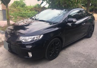 Kia Forte Koup 2010 - Mình bán xe Kia Forte Koup 2010 tự động, hai cửa, màu đen, xe cực chất