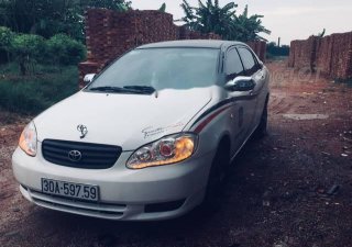 Toyota Corolla   2004 - Bán Toyota Corolla sản xuất năm 2004, màu trắng, 197 triệu