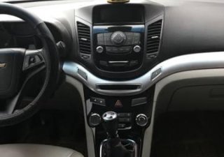 Chevrolet Orlando 2012 - Cần bán gấp Chevrolet Orlando sản xuất năm 2012, màu bạc còn mới, giá 410tr
