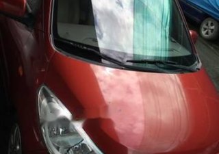Hyundai i10    2012 - Bán Hyundai i10 sản xuất 2012, màu đỏ, xe gia đình sử dụng, ít đi còn mới