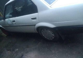 Toyota Corolla 1.3 1986 - Cần bán Toyota Corolla 1.3 đời 1986, màu trắng giá cạnh tranh