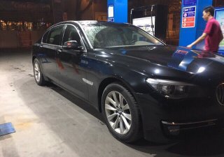 BMW 7 Series 730Li 2014 - Bán xe BMW 730Li vin 2014, đăng kí 2015 màu đen, xe chính chủ đẹp hoàn hảo