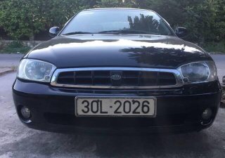 Kia Spectra   2004 - Cần bán xe Kia Spectra năm 2004, màu đen xe gia đình
