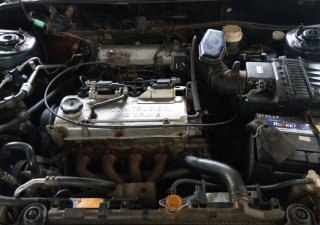 Mitsubishi Lancer 2001 - Cần bán Mitsubishi Lancer năm 2001, màu đen, nhập khẩu nguyên chiếc