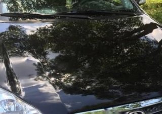 Toyota Corolla 2004 - Bán Toyota Corolla sản xuất năm 2004, màu đen, giá 260tr