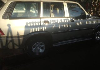 Ssangyong Musso 2005 - Bán Ssangyong Musso năm 2005, màu ghi vàng 