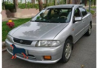 Mazda 323 2000 - Bán ô tô Mazda 323 đời 2000, màu xám, giá tốt