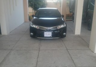 Toyota Corolla altis G 2015 - Bán ô tô Toyota Corolla altis G sản xuất năm 2015, màu đen