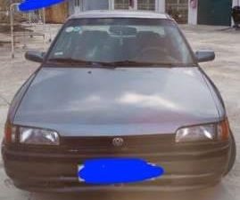 Mazda 323 1995 - Bán Mazda 323 đời 1995, màu xanh