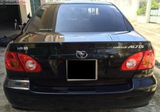 Toyota Corolla altis 1.8G MT 2003 - Bán xe Toyota Corolla Altis 1.8G MT 2003, màu đen xe gia đình