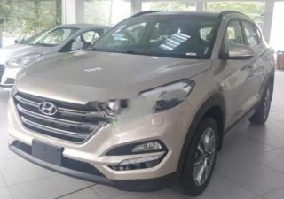 Hyundai Tucson 2.0 ATH 2018 - Bán xe Hyundai Tucson 2.0 ATH sản xuất năm 2018, màu vàng, giá 825tr