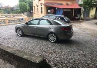 Kia Cerato   2010 - Cần bán Kia Cerato đời 2010, màu xám giá tốt