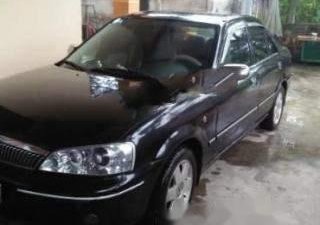 Ford Laser   Ghia 1.8 MT 2003 - Cần bán gấp Ford Laser Ghia 1.8 MT năm 2003, màu đen, giá tốt 