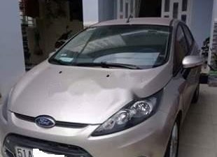 Ford Fiesta 2011 - Bán Ford Fiesta đời 2011, màu vàng cát