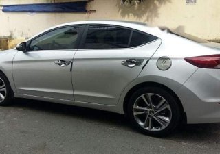 Hyundai Elantra 2.0AT 2016 - Bán Hyundai Elantra 2.0AT đời 2016, màu bạc, giá chỉ 650 triệu