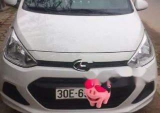 Hyundai Grand i10 2016 - Gia đình bán Hyundai Grand i10 sản xuất năm 2016, màu bạc