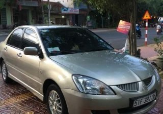 Mitsubishi Lancer 2004 - Bán Mitsubishi Lancer sản xuất năm 2004, màu ghi vàng