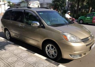 Toyota Sienna Limited 3.3L AT 2004 - Bán Toyota Sienna Limited 3.3L AT sản xuất 2004, màu vàng, giá 548tr