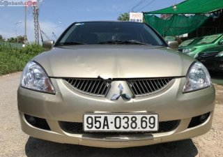 Mitsubishi Galant 1.5 2003 - Bán lại xe Mitsubishi Galant 1.5 2003, màu vàng cát