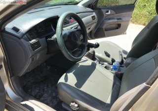 Mitsubishi Galant 1.5 2003 - Bán lại xe Mitsubishi Galant 1.5 2003, màu vàng cát