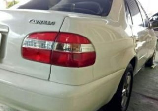 Toyota Corolla   2001 - Bán Toyota Corolla sản xuất năm 2001, màu trắng, 132 triệu