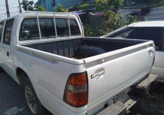 Isuzu Dmax 2000 - Cần bán gấp Isuzu Dmax bán tải đời 2000, màu trắng còn mới, giá tốt 85 triệu