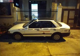 Mazda 323 1996 - Cần bán gấp Mazda 323 đời 1996, màu trắng, nhập khẩu nguyên chiếc