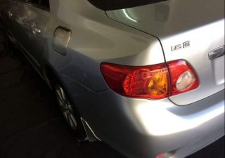 Toyota Corolla altis   1.8G 2009 - Cần bán lại xe Toyota Corolla altis 1.8G 2009, màu bạc 
