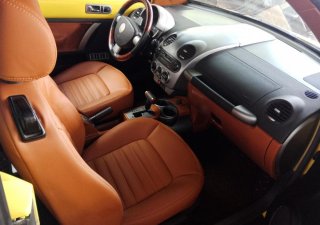 Volkswagen New Beetle    2003 - Xe Volkswagen New Beetle mui trần, đăng ký lần đầu 2003, màu vàng xe nhập