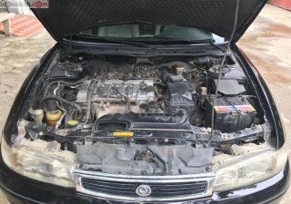Mazda 626 1997 - Cần bán xe Mazda 626 1997, màu đen, nhập khẩu nguyên chiếc 