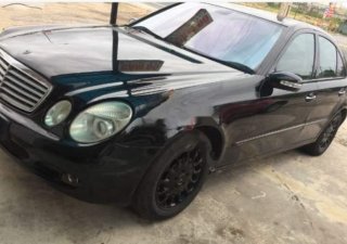 Mercedes-Benz E class E200 2004 - Cần bán xe Mercedes E200 năm 2004, màu đen xe gia đình