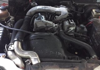Ssangyong Musso 2.3 2002 - Cần bán lại xe Ssangyong Musso 2.3 đời 2002, màu bạc, nhập khẩu
